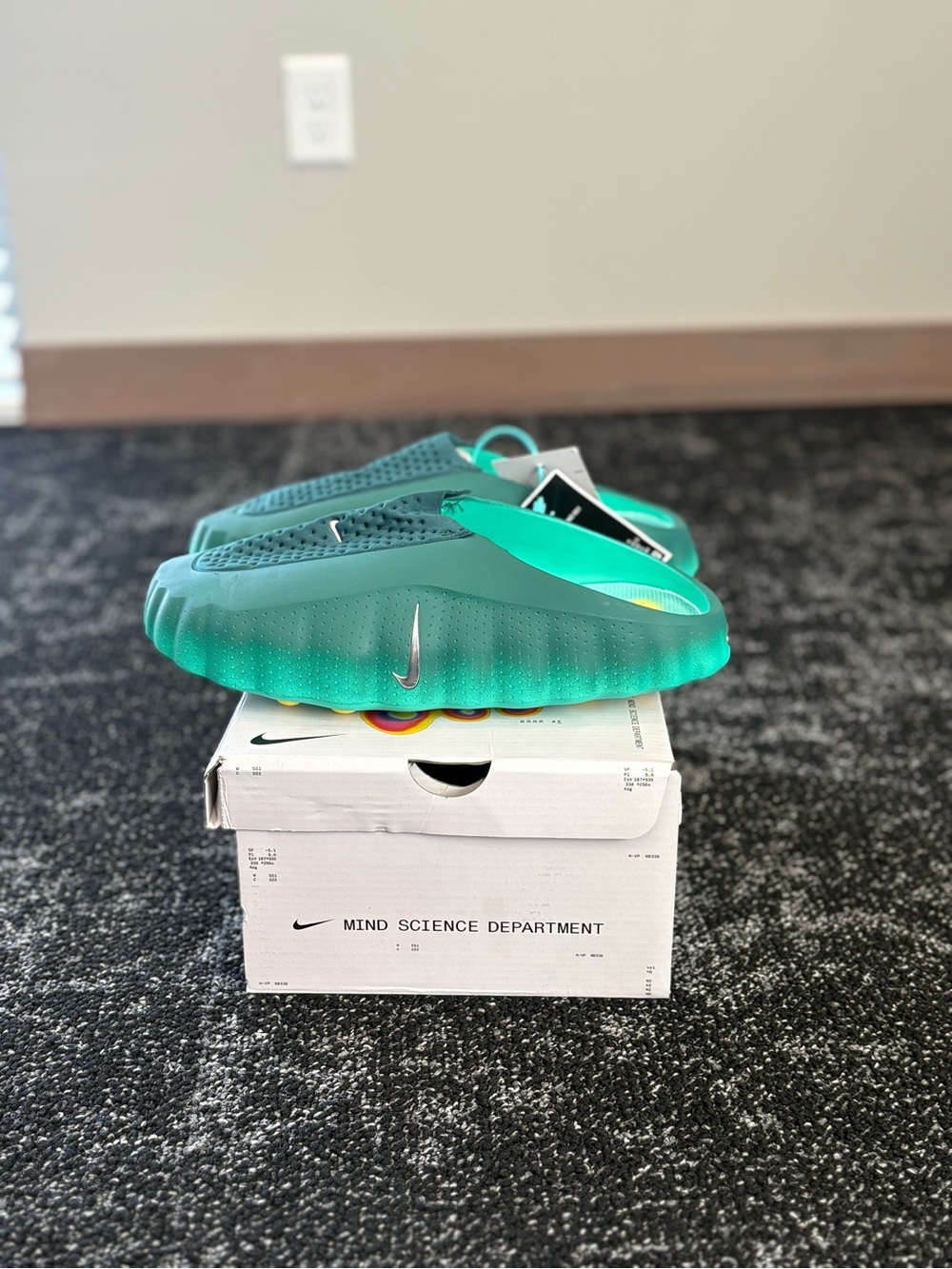 Nike Teal Green Slide Sandals with Silver Swoosh